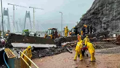 Mumbai on orange alert as heavy rain shuts schools, disrupts trains and floods roads