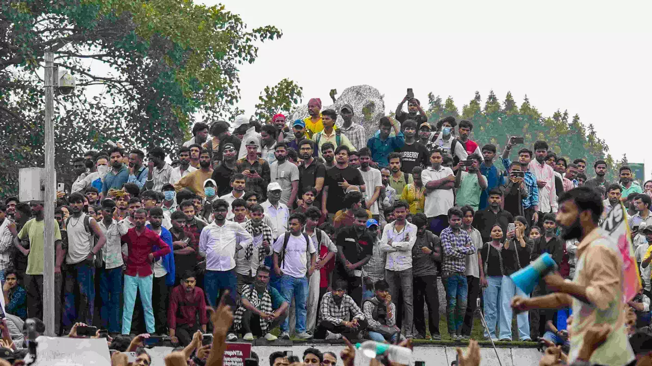 Cockroach Janata Party (CJP) supporters gather during a protest march, at Connaught Place