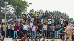 Cockroach Janata Party (CJP) supporters gather during a protest march, at Connaught Place