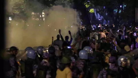 Security officials use tear gas during the ongoing protest over alleged irregularities in the NEET examination, near Jantar Mantar in New Delhi Security officials use tear gas during the ongoing protest over alleged irregularities in the NEET examination, near Jantar Mantar in New Delhi