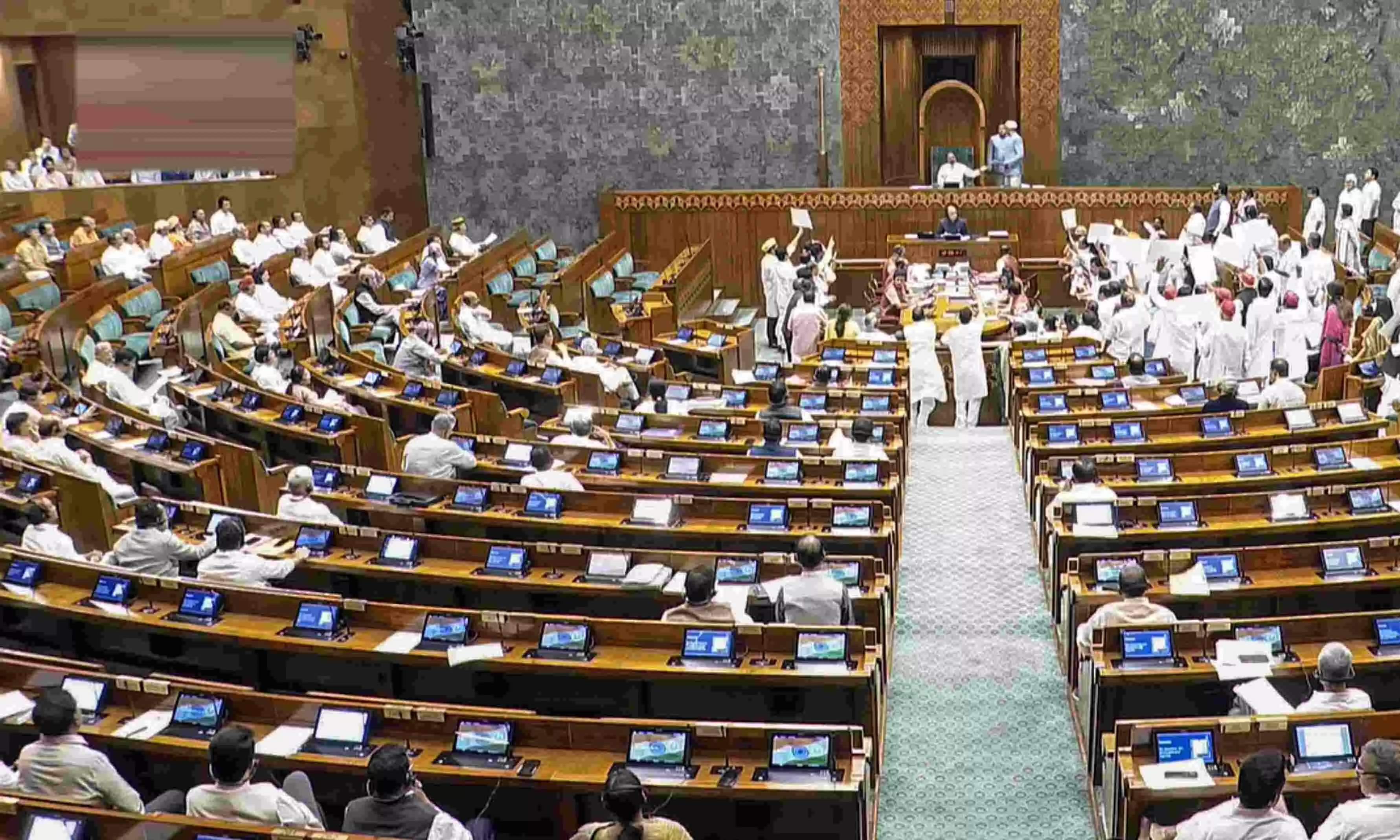 Opposition MPs stage a protest in the Lok Sabha Opposition MPs stage a protest in the Lok Sabha