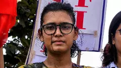 All India Students Association (AISA) National President Neha Bora after a man threw ink on her during a protest