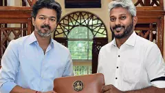 CM Vijay with Finance Minister Mari Wilson