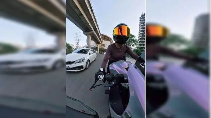 Woman biker Sia