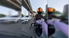 Woman biker Sia