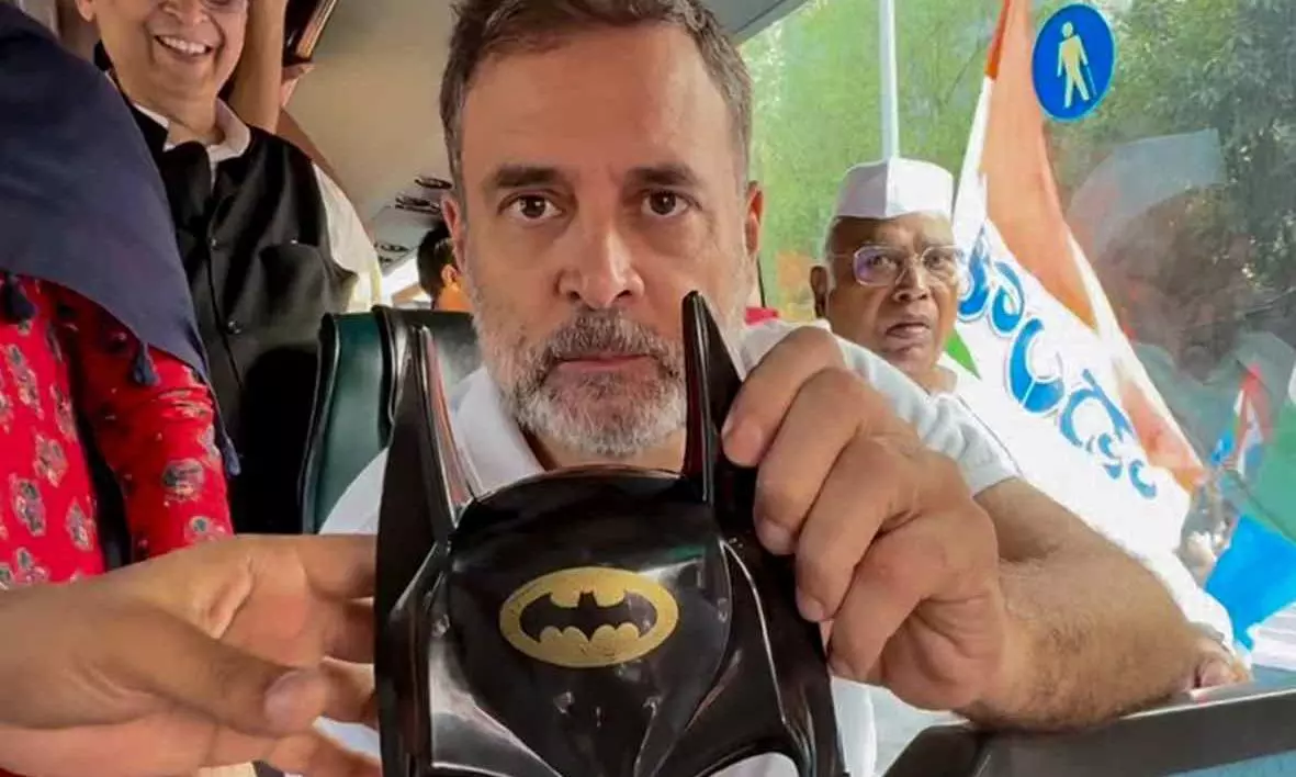 Rahul Gandhi displaying Batman mask Rahul Gandhi displaying Batman mask