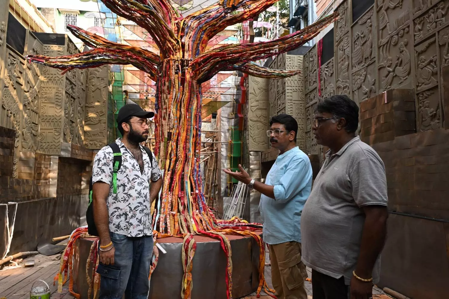 Abhirup Roychowdhury (left) with other organisers of the Adi Ballygunge Sarbojanin Durga Puja Parishad in Kolkatas Golpark.