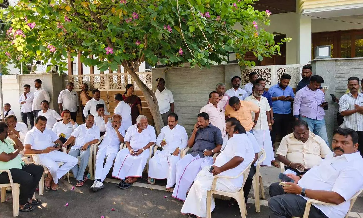 DMK cadres gather outside former minister K.N. Nehru DMK cadres gather outside former minister K.N. Nehru