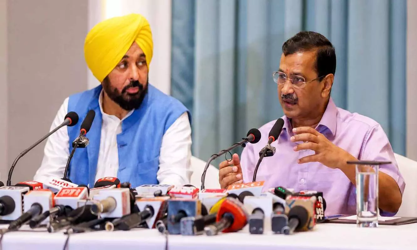 Bhagwant Mann and Arvind Kejriwal Bhagwant Mann and Arvind Kejriwal