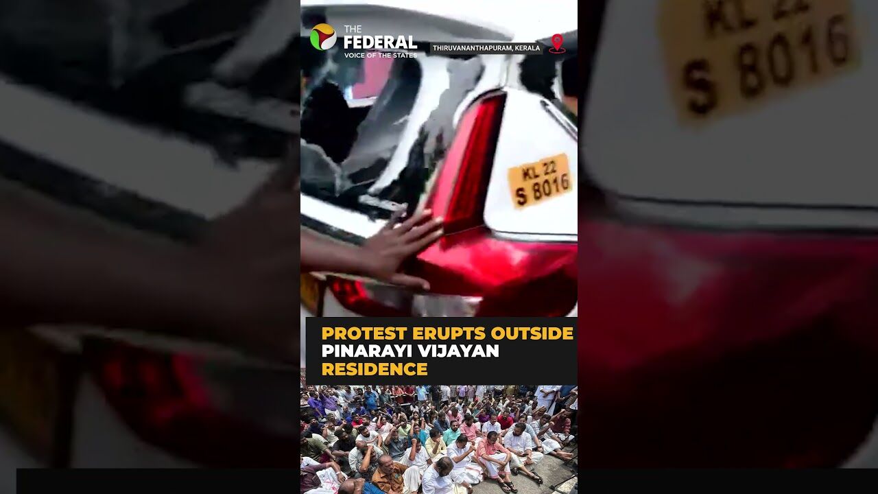 CPI(M) workers attack ED vehicle during protest outside Pinarayis residence